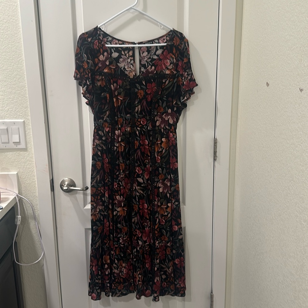 Beautiful Torrid dress size 00 (12). Floral pattern with lace detail.